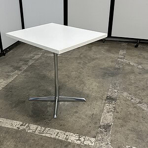 Herman Miller square table with chrome base and white top, 24" x 30".