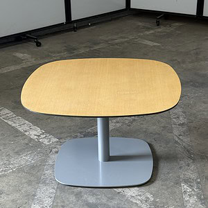 Modern maple top occasional table with silver base, 30" wide, 18" tall.