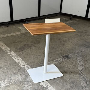 Modern Hightower laptop table with cherry wood top and white metal base, ideal for workspaces.