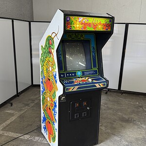 Atari Centipede arcade game with colorful artwork and classic gameplay.