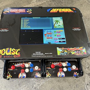 Arcade game with 20" LED screen for multiplayer gaming experience. Perfect for entertainment venues.