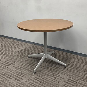Steelcase Coalesse 36-inch round table with espresso finish and X-shaped base, ideal for modern offi.