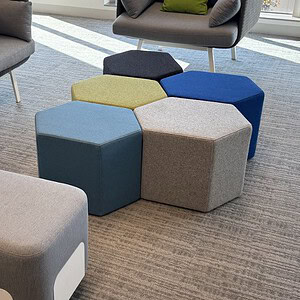 Colorful Hexagon Ottomans for Modern Living Spaces.