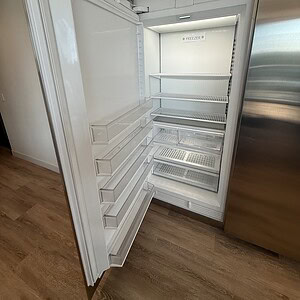 Sub Zero commercial refrigerator with touch screen, WiFi connectivity, and multiple adjustable shelv.