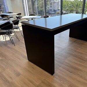 OFS Marble 8'x3'x43" Espresso Bar Height Island Table for modern kitchens and commercial spaces.