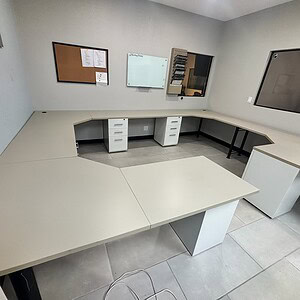 Modern wrap-around corner desks with BBF pedestals for optimal workspace.