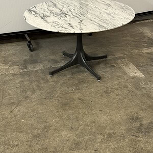 Herman Miller Eames marble table with graphite base, white marble top, 28.5”Wx17”T.