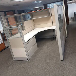 Ethospace double glass office workstation with neutral tones and silver accents.