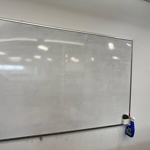 Glass whiteboard for office or classroom use.