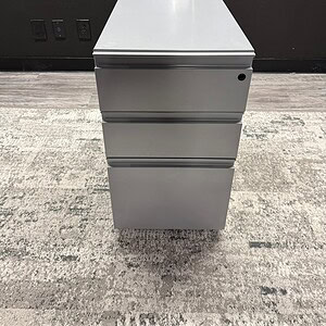 Silver mobile storage pedestal with 22-inch depth, ideal for office organization and workspace effic.