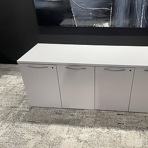 Modern white double vertical credenza, 6’W x 2’D x 28”T, ideal for office or conference room storage.