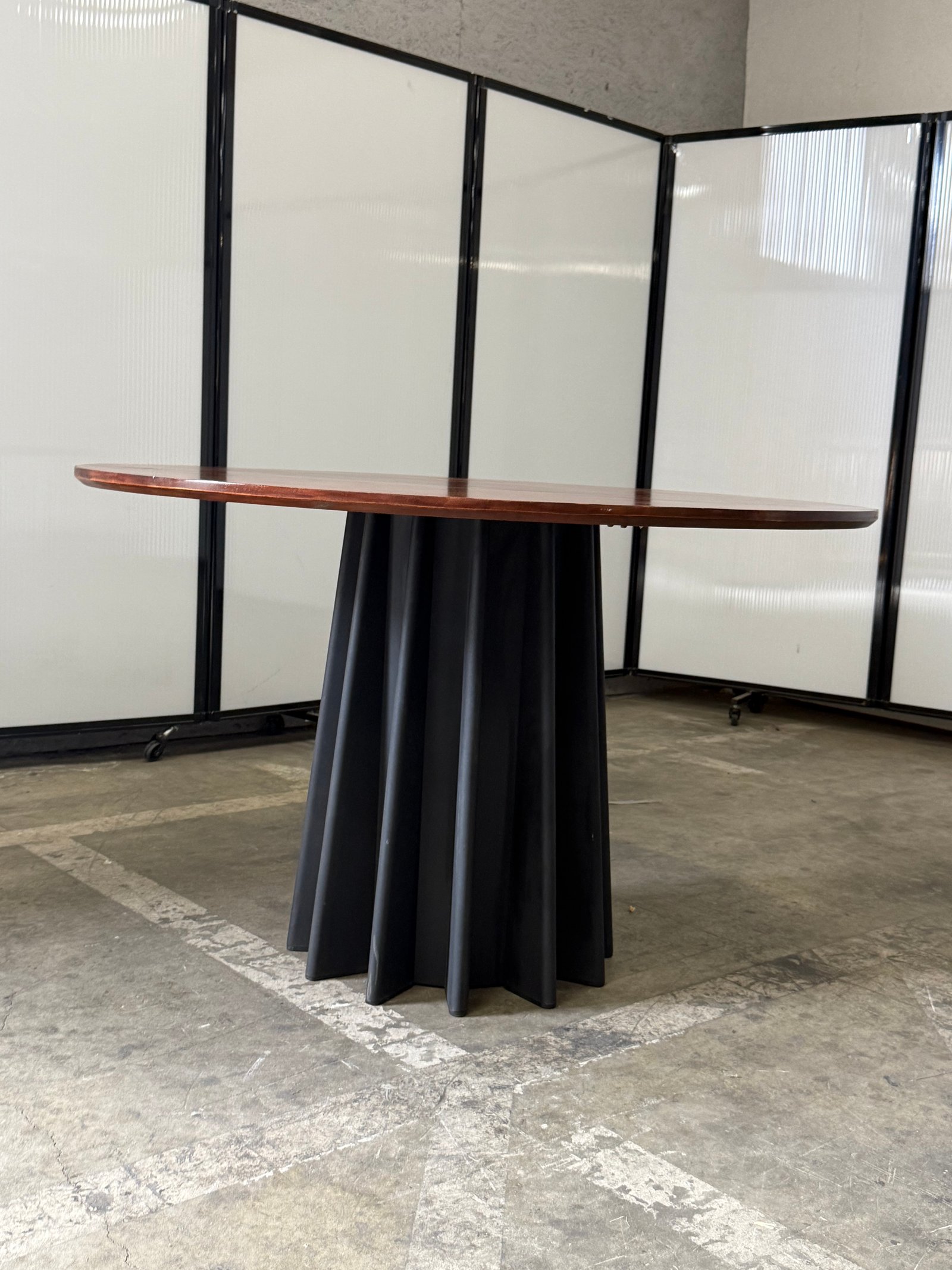 Andreu World round American oak with black metal base 48"Wx29.5"T