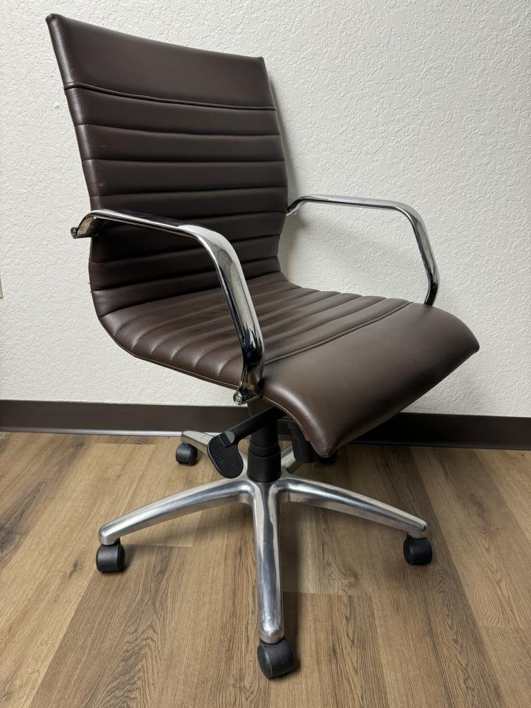 Compel brown vinyl chrome chairs