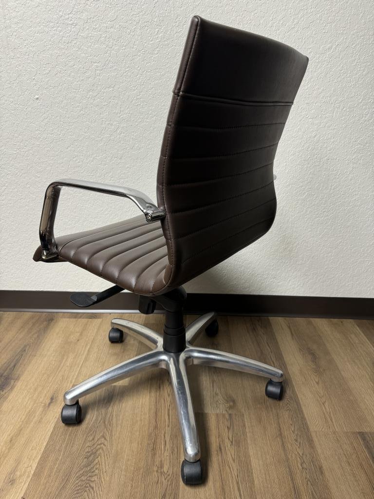 Compel brown vinyl chrome chairs