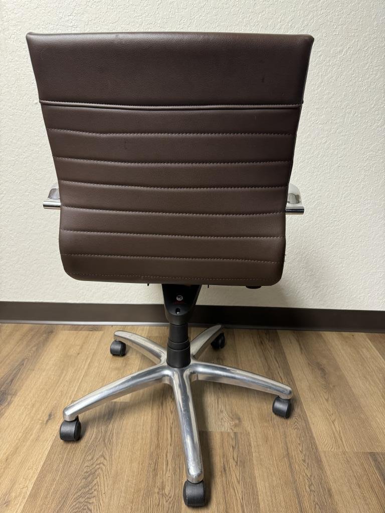 Compel brown vinyl chrome chairs
