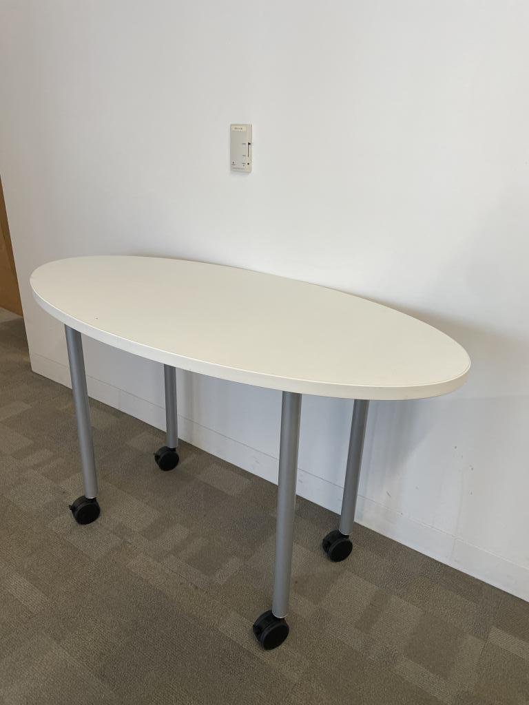Steelcase white 4x2 oval table on casters