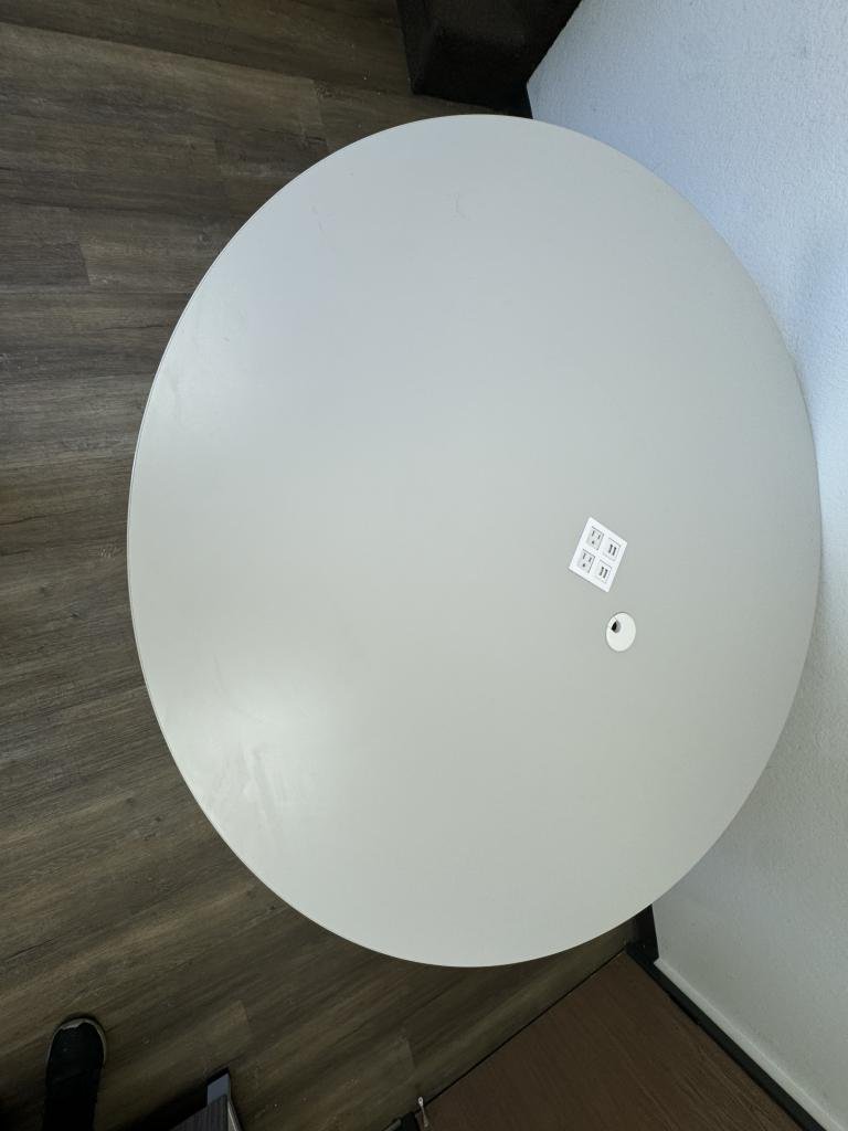 Knoll powered 48in round grey top wood legs