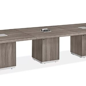 Conference table with integrated power outlets and sleek wood finish.