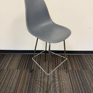 Contemporary gray office chair with sleek metal frame for modern workspace comfort.
