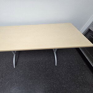 Haworth Maple training table with steel legs for educational use.