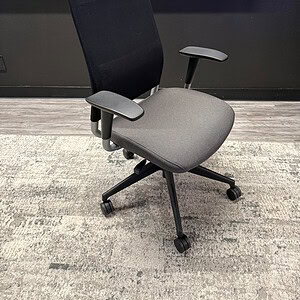 Ergonomic office chair with high back in grey and black for workspace comfort.