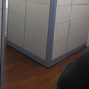 Herman Miller Ethospace 86" tall L-shaped room divider in office.