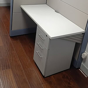 Cool grey Herman Miller Ethospace room divider with light silver fabric.