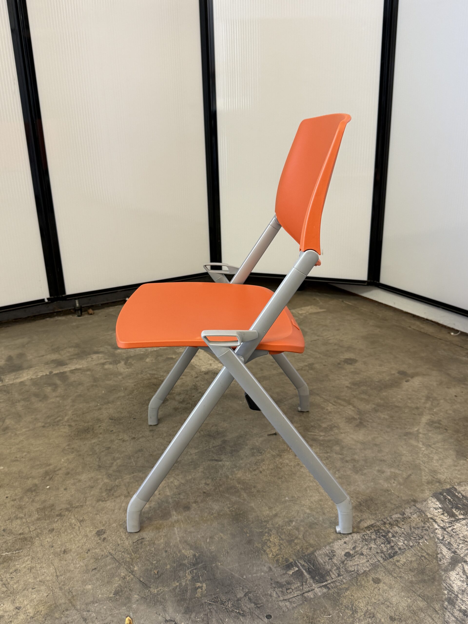Allsteel stationary nesting chair in orange.