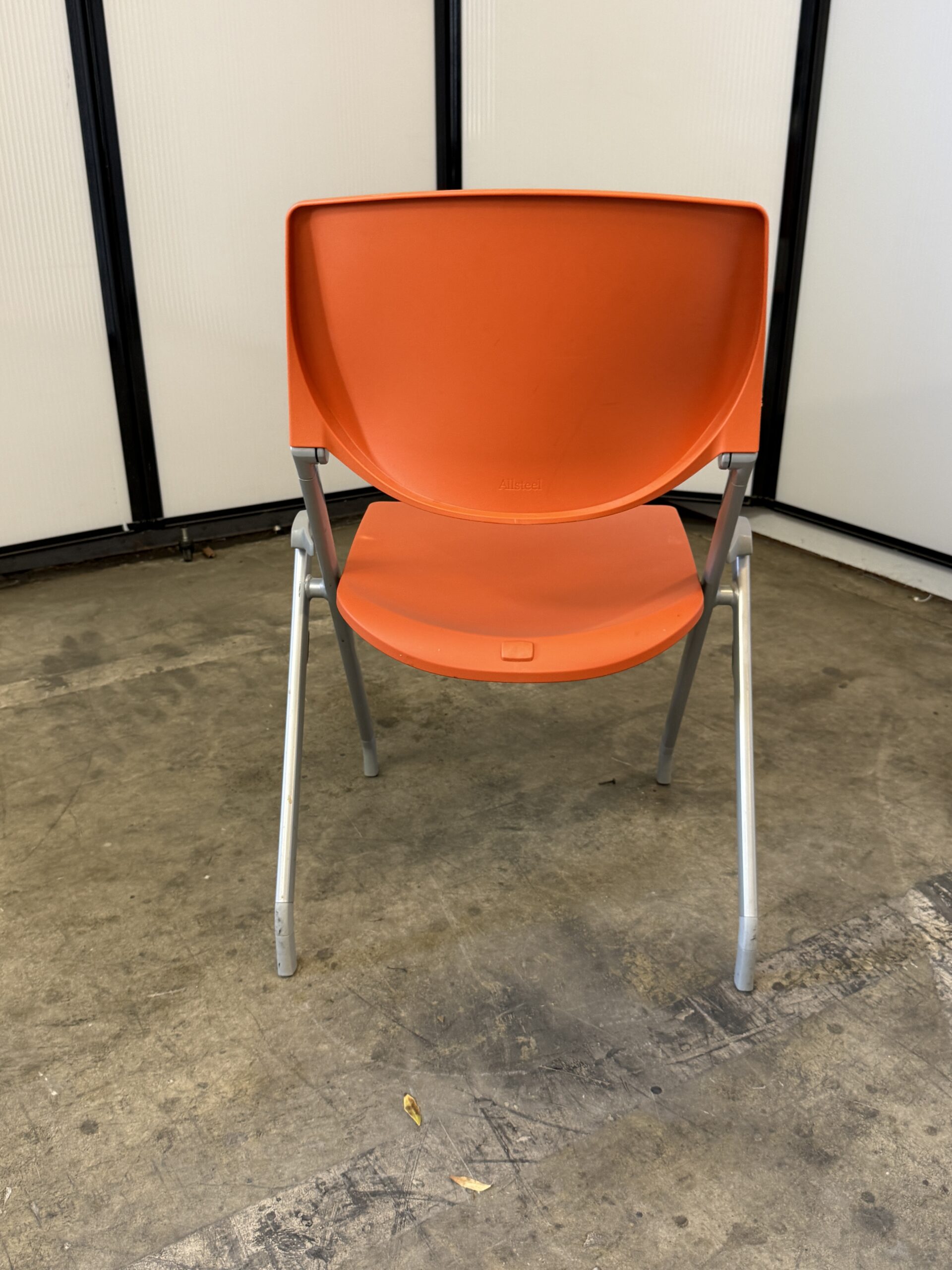 Allsteel stationary nesting chair in orange.