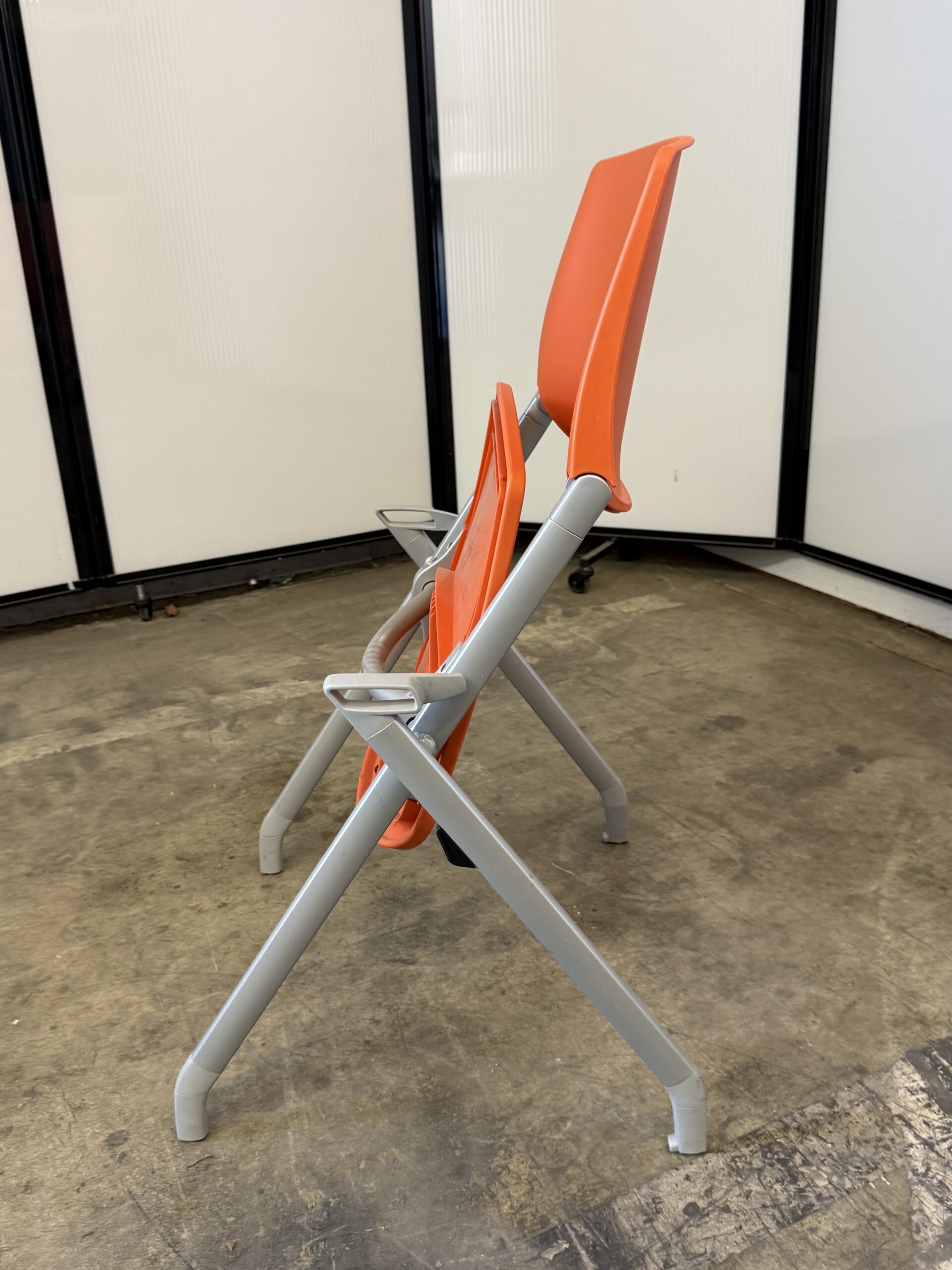 Allsteel stationary nesting chair in orange.