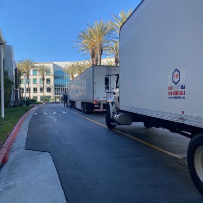 Fleet of Cube World USA delivery trucks ready for nationwide shipping.