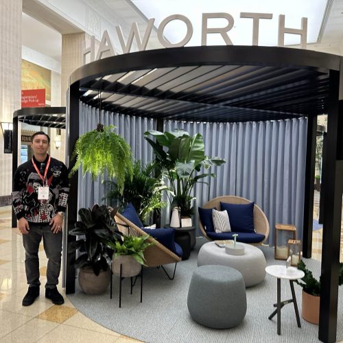 Commercial Brokers, Dealers, and Partners booth showcasing innovative cube-shaped lounge area.