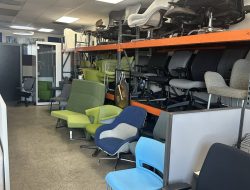 Comfortable office chairs and seating solutions displayed in a showroom.