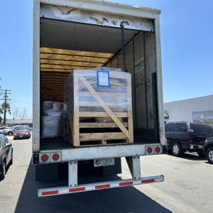 Shipping container with palletized goods ready for nationwide and international delivery.