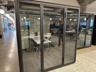 Office pod for private meetings and focused work during facility relocation.