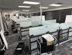 Office cubicles during facility decommissioning and relocation at Cube World USA.