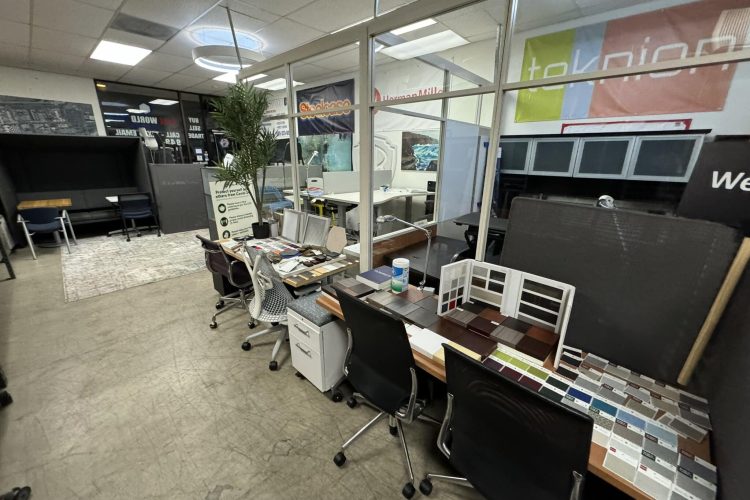 Interior view of office floor plan and design workspace at Cube World USA.