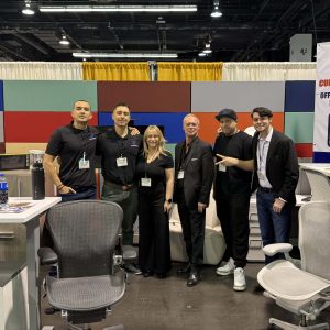 Office furniture showroom booth at Cube World USA trade show.