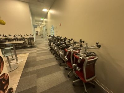 Office furniture liquidation sale with discounted chairs and desks at Cube World USA.