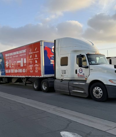 Truck with advertising trailer for Cube World USA.