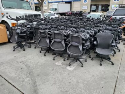 Office chairs and desks for liquidation sale at Cube World USA.