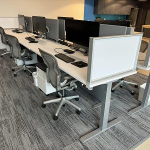 Office workstation with cubicle partitions for installation services.