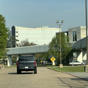 Contemporary office buildings at Cube World USA with parking area.