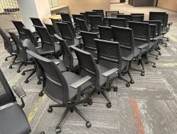 Office chairs arranged for workspace relocation.