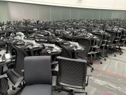 Office furniture storage and decommissioning at Cube World USA during facility relocation.