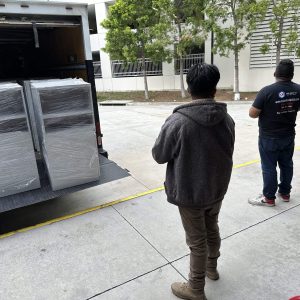 Loading appliances for installation at a residential site.