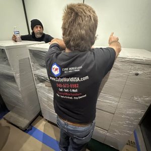 Installation of large equipment by Cube World USA team.