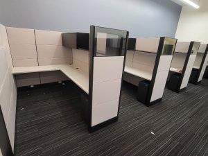 Modern office cubicles with privacy panels at Cube World USA.