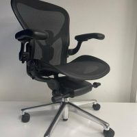 Ergonomic mesh office chair with adjustable height and lumbar support.