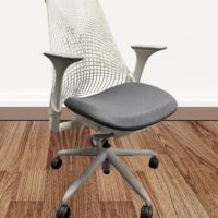 Ergonomic office chair with mesh back, adjustable armrests, and wheels for comfort and support.